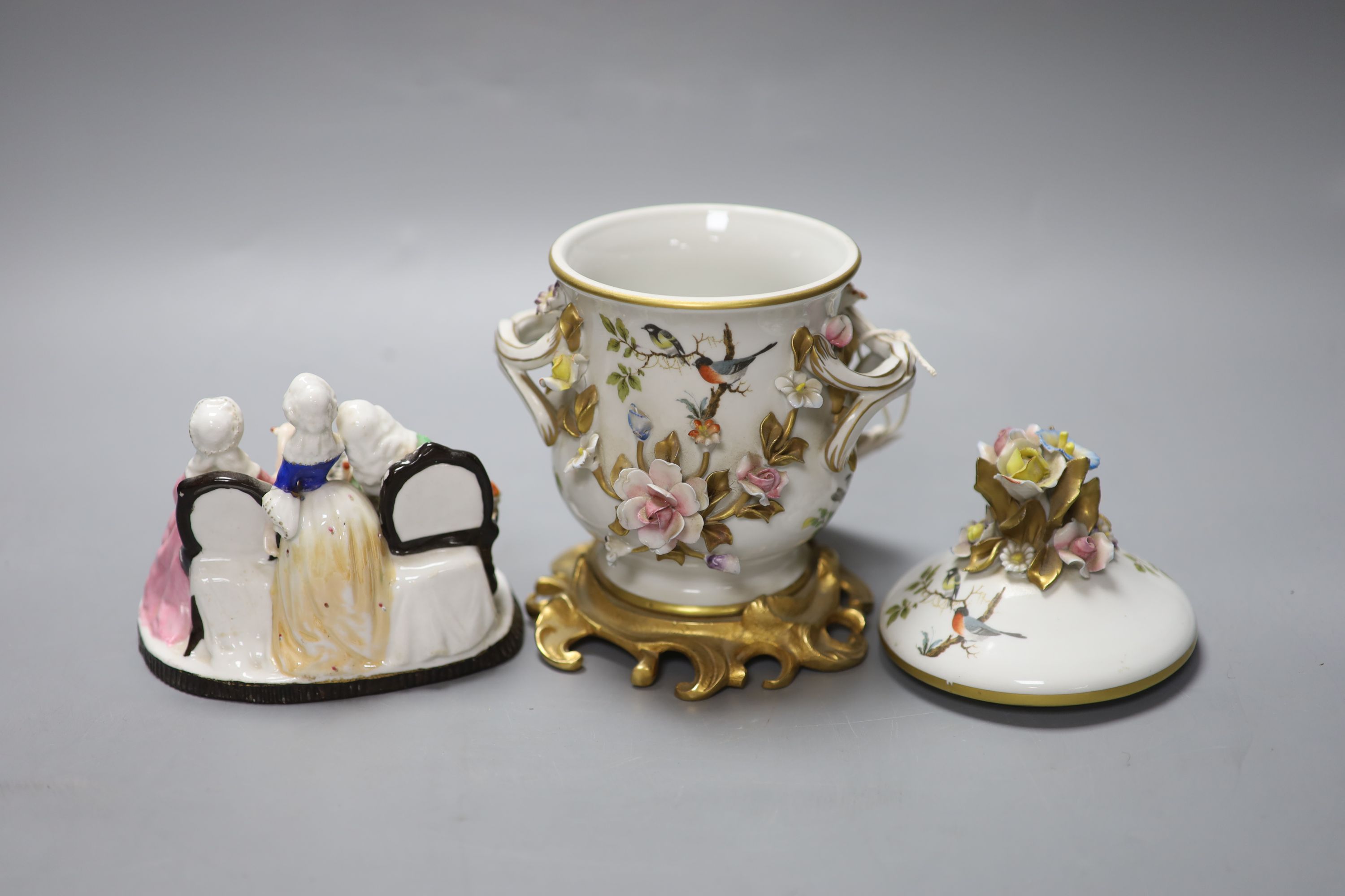 A Dresden porringer and three Continental porcelain figure groups, tallest 21cm